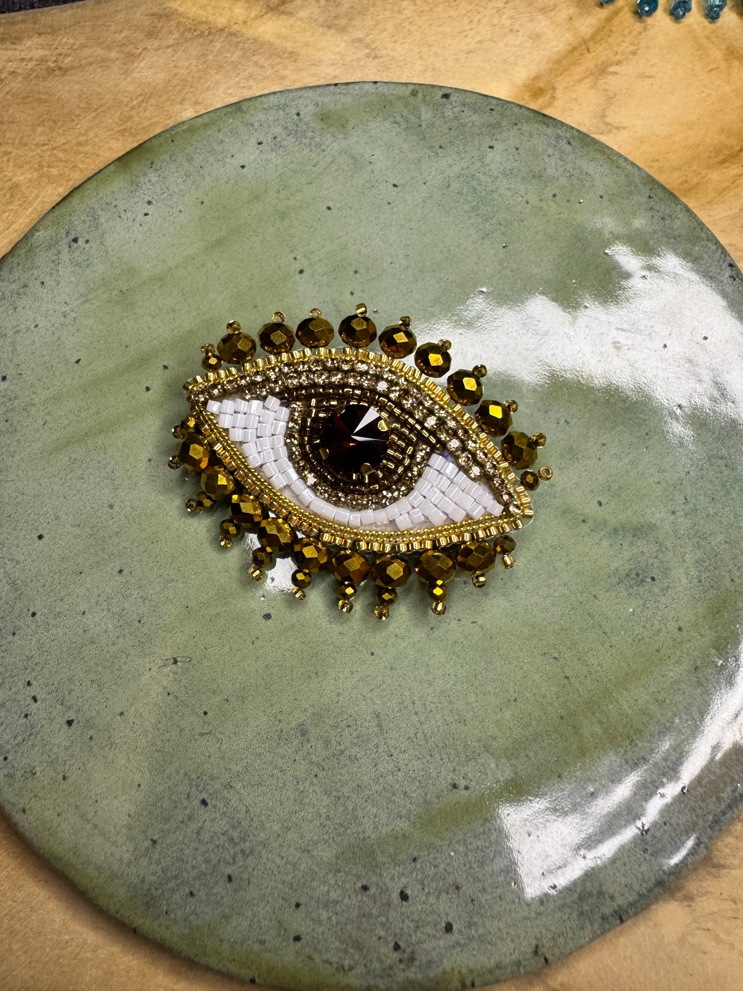 Eye brooches