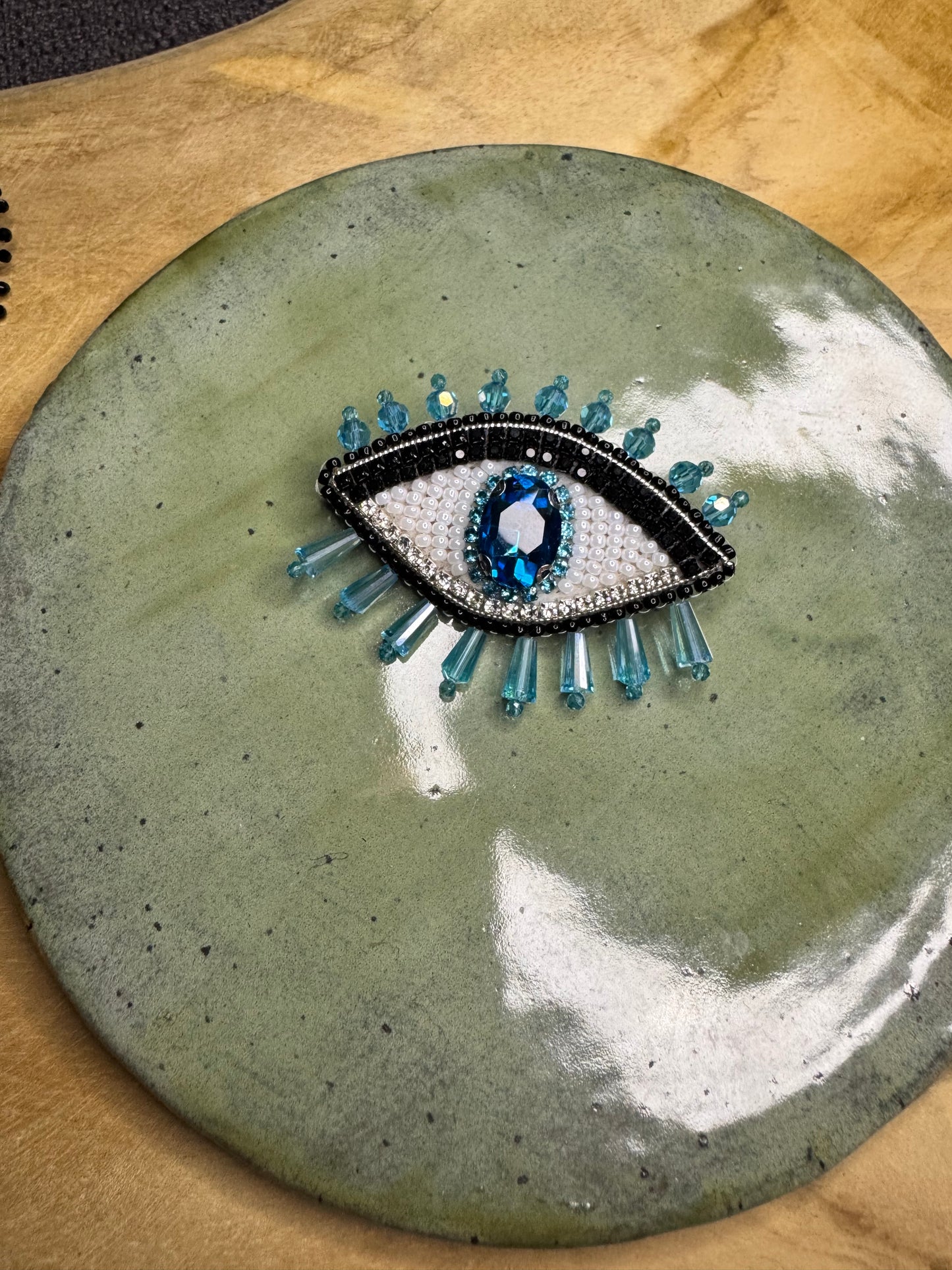 Eye brooches