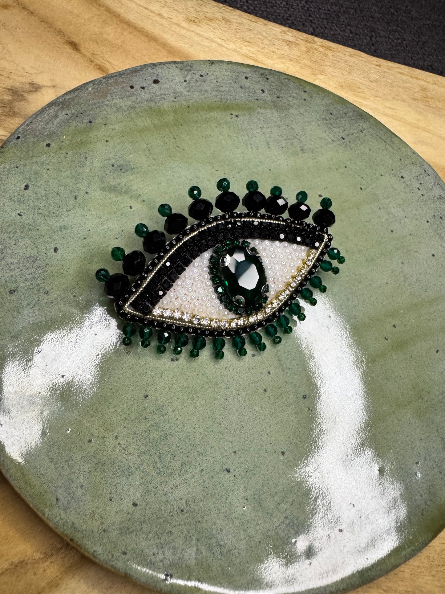 Eye brooches