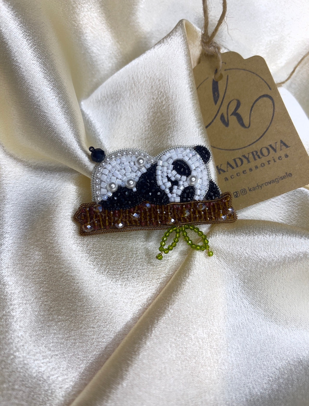 Sleeping panda brooch