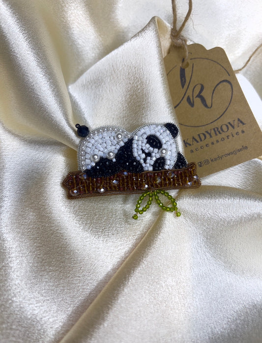 Sleeping panda brooch