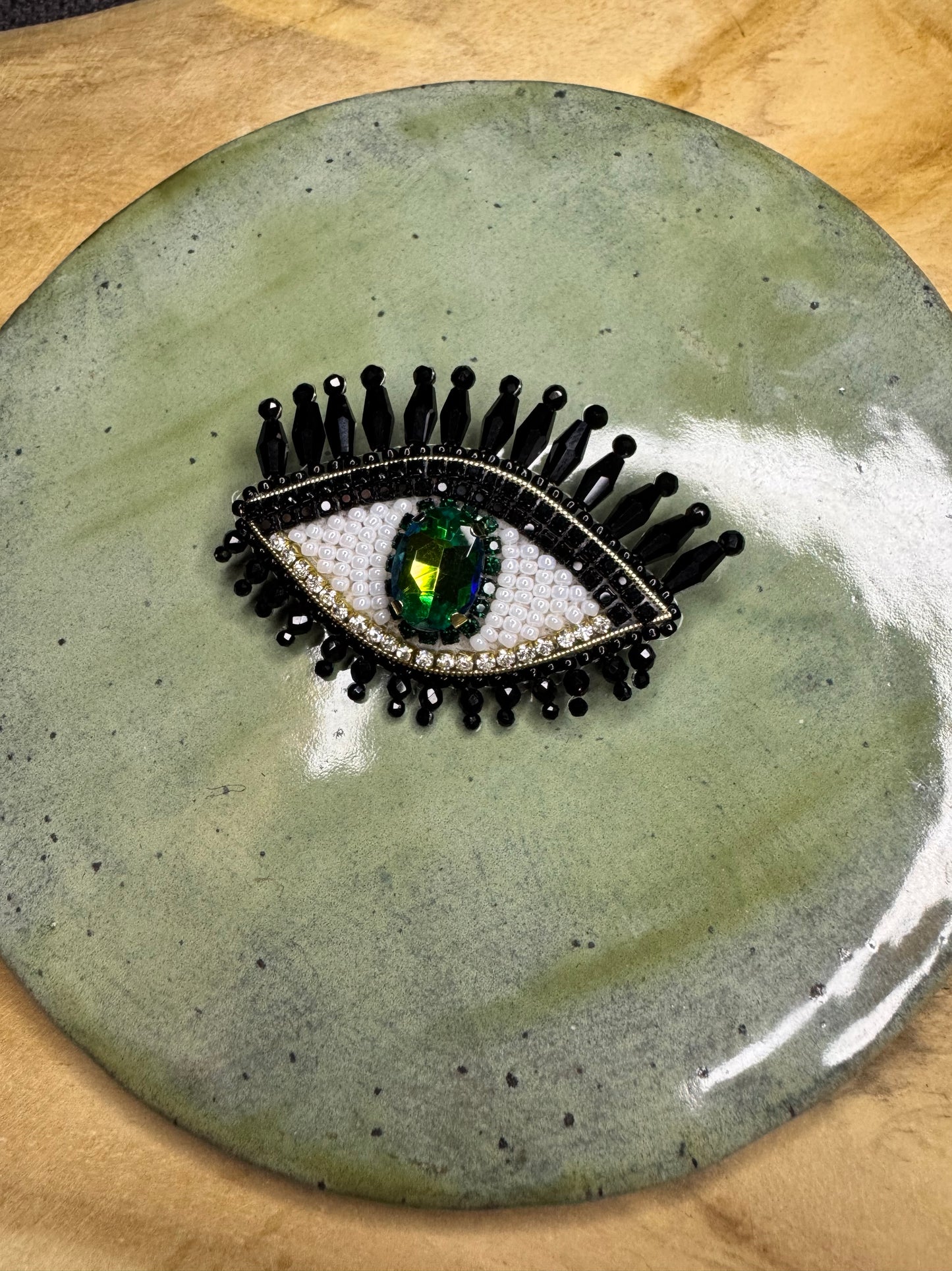 Eye brooches