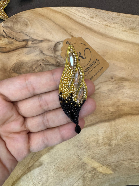 Brooch feather