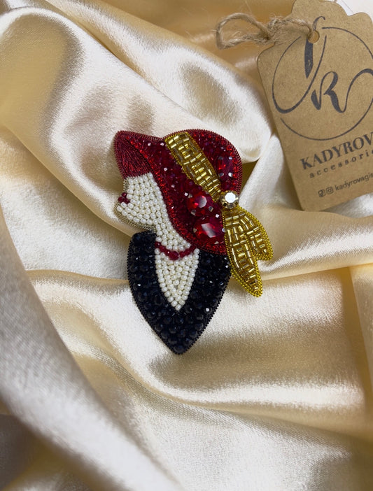 Brooch Lady in a red hat