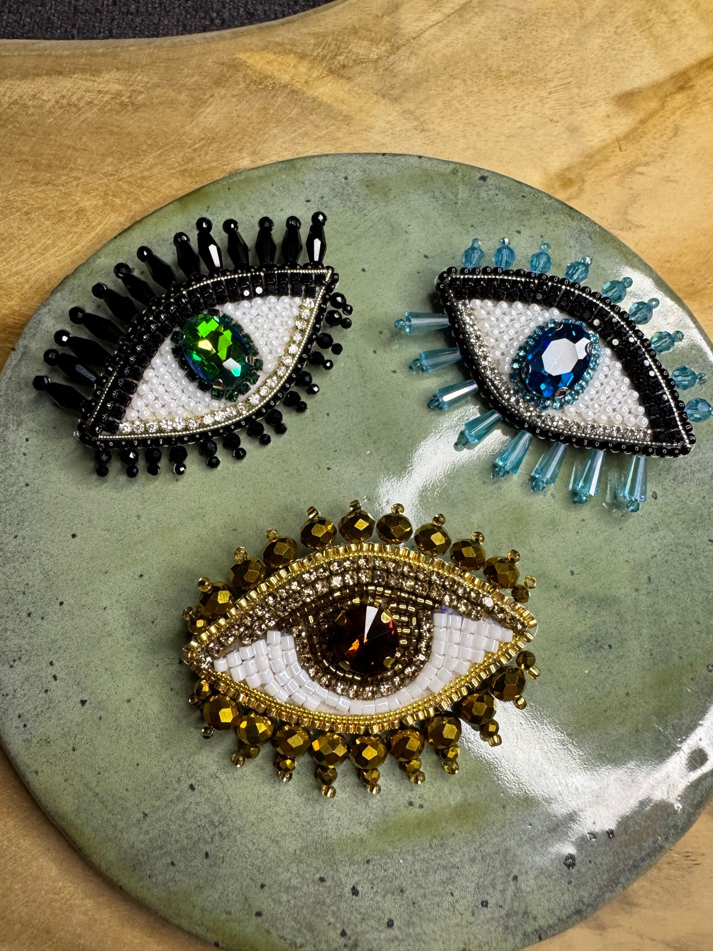 Eye brooches