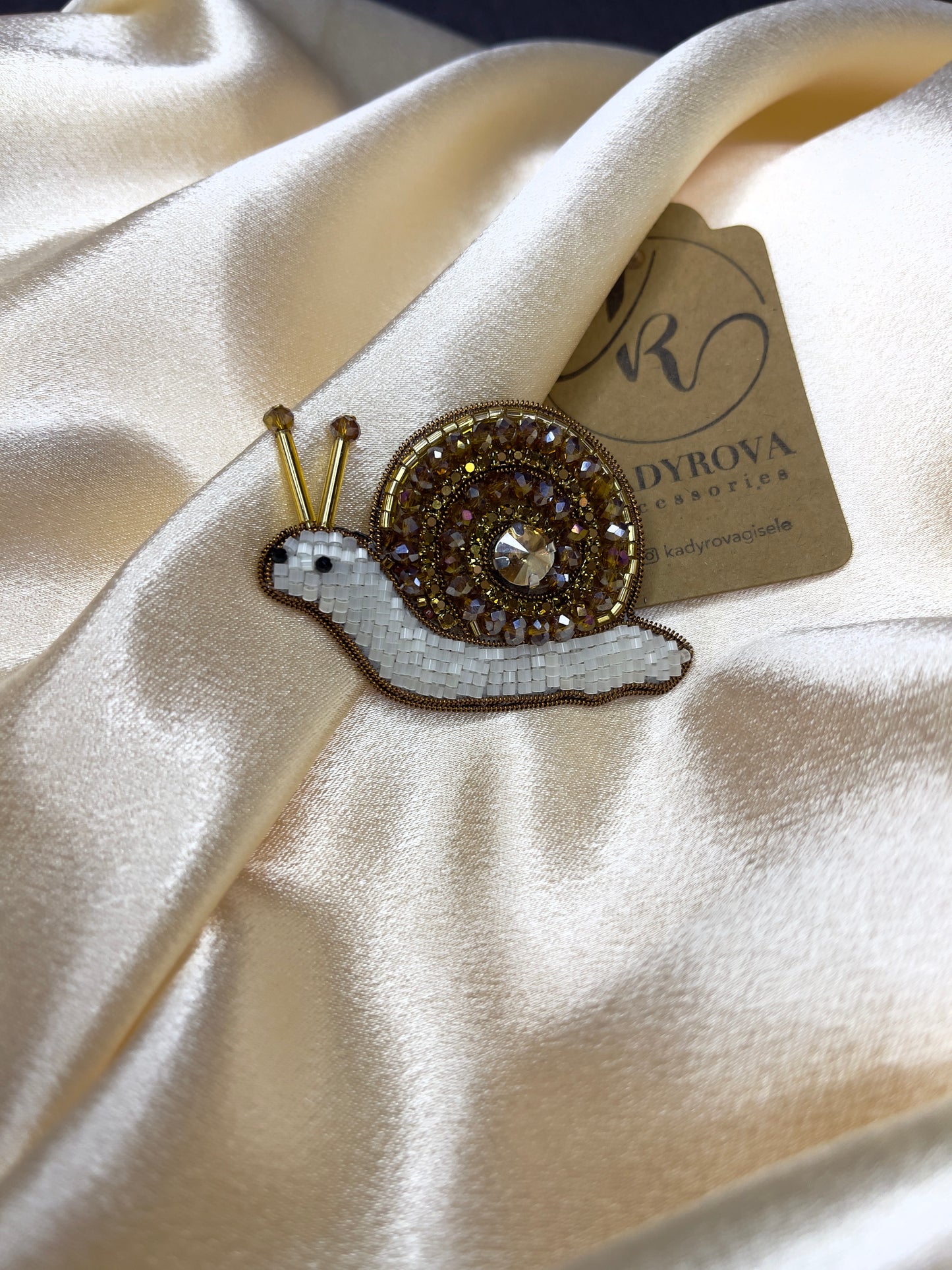 Snail brooch