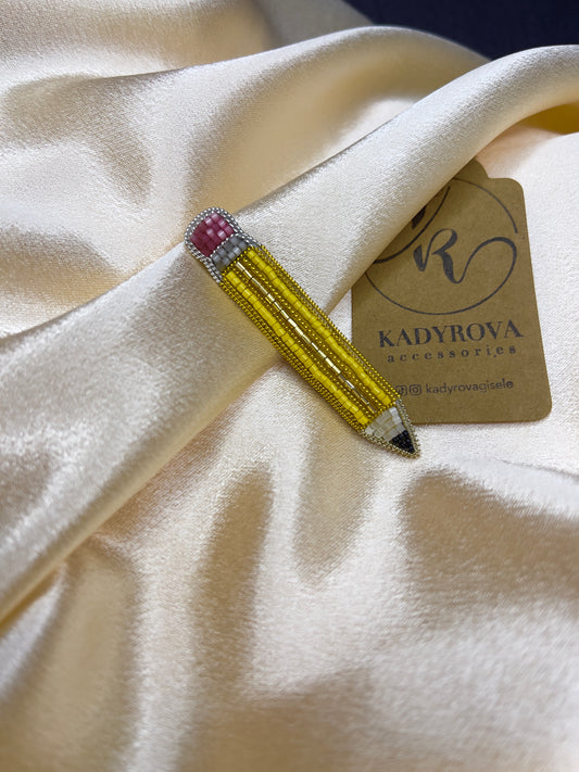 Pencil brooch