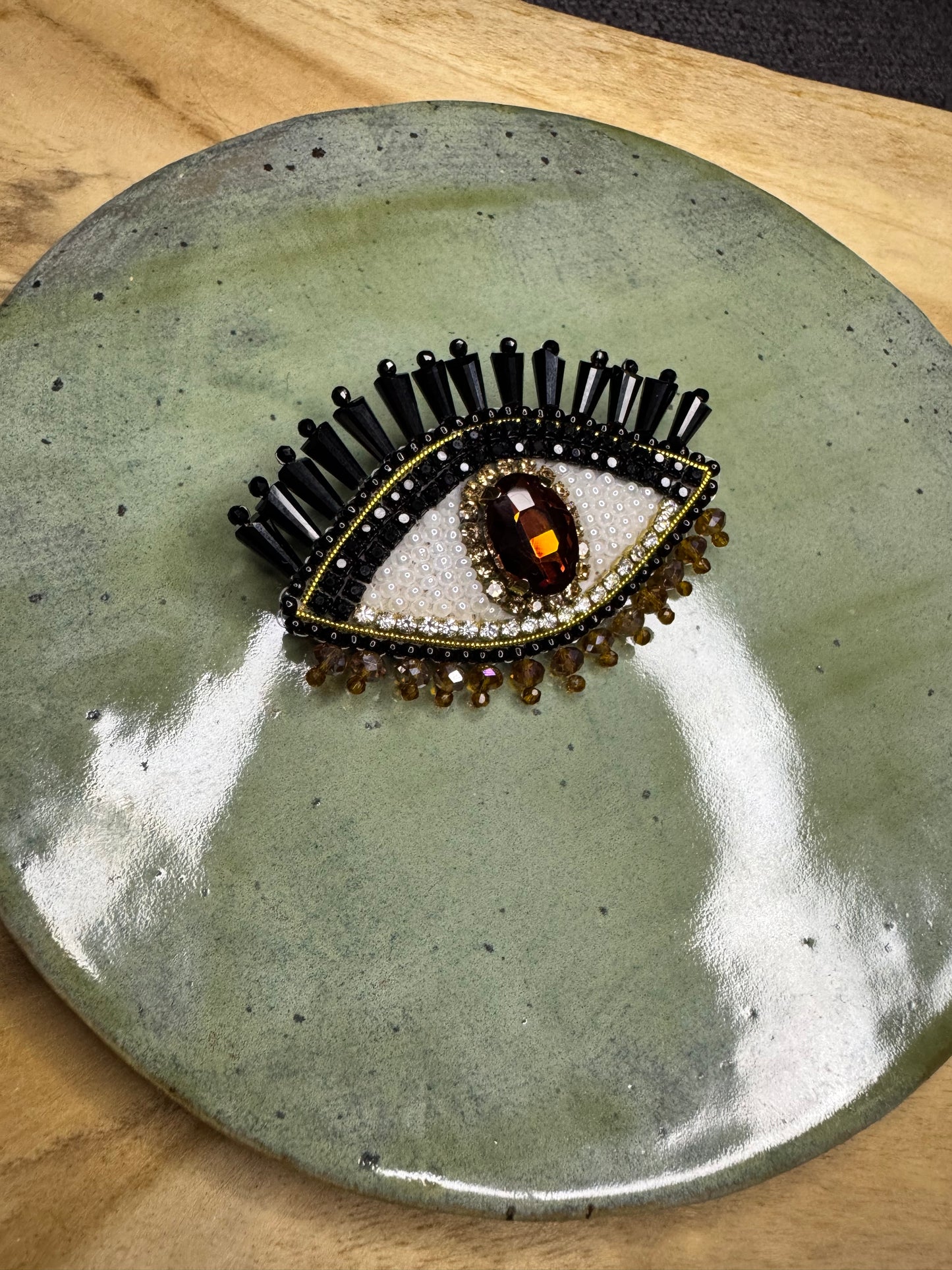 Eye brooches