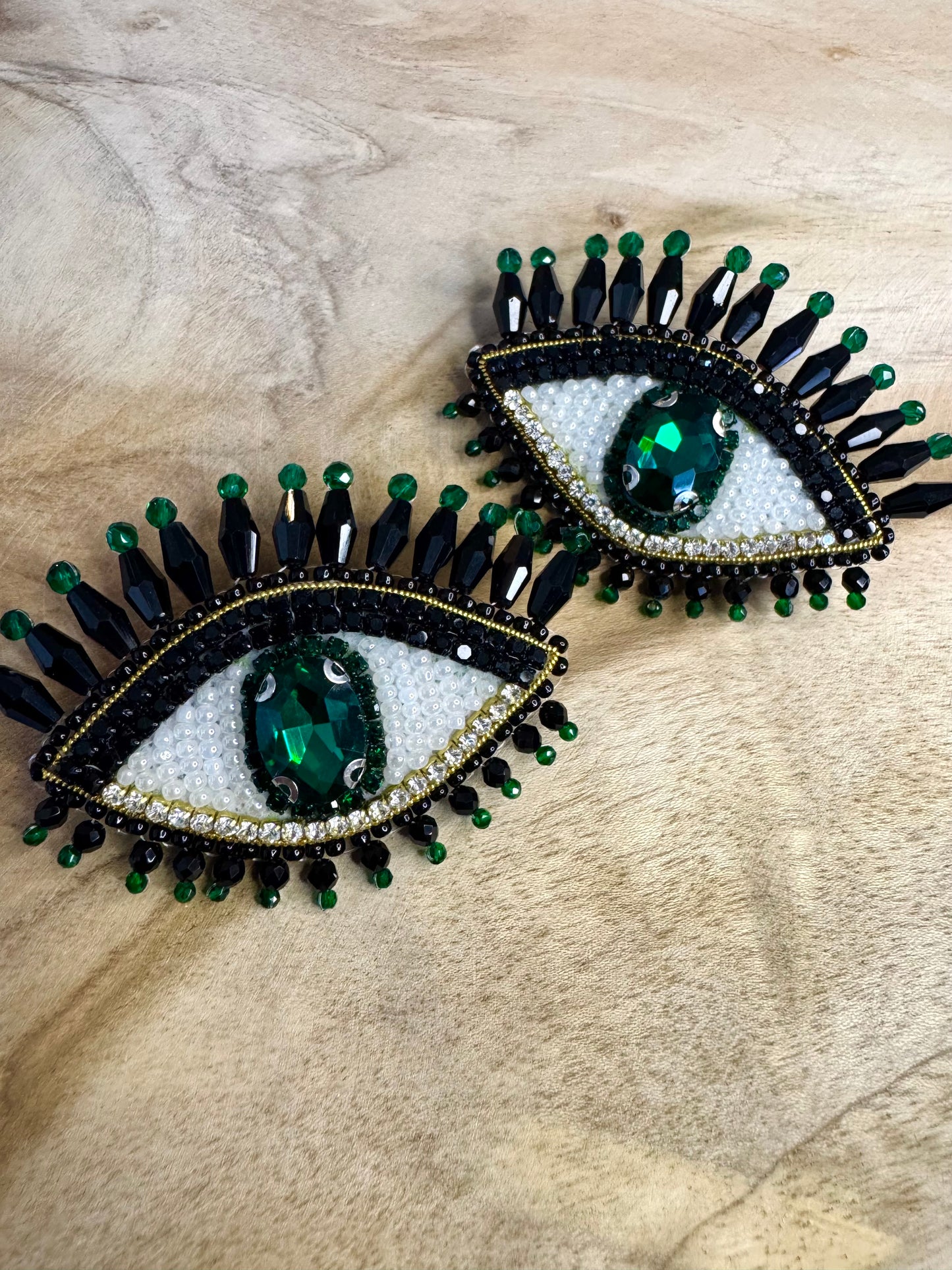 Eye brooches