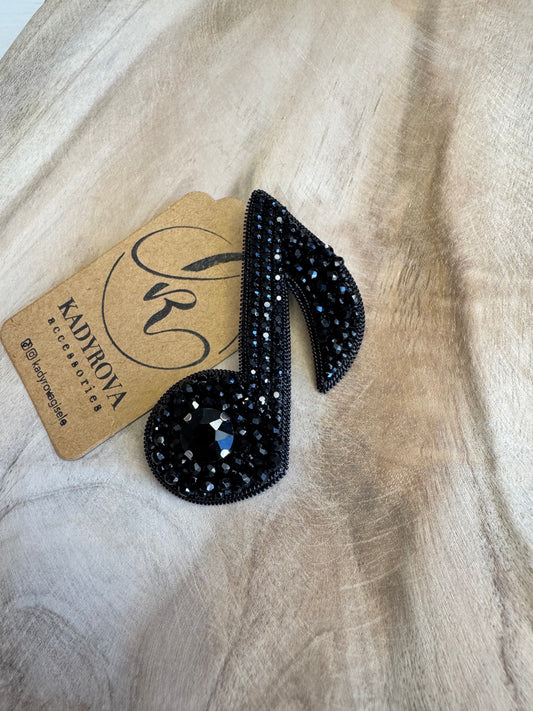Musical note brooch