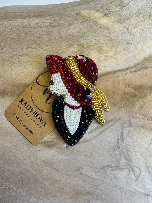 Brooch Lady in a red hat