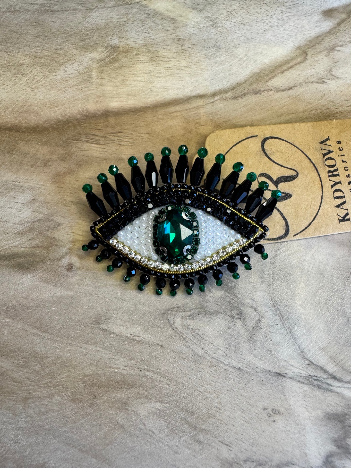 Eye brooches