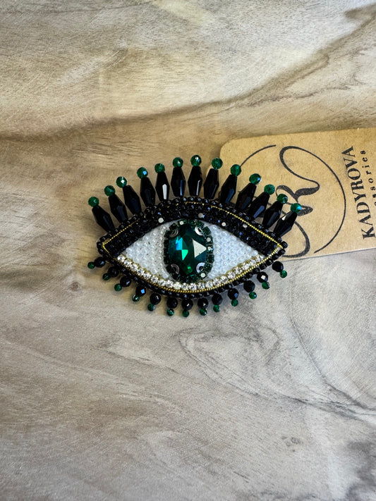 Eye brooches